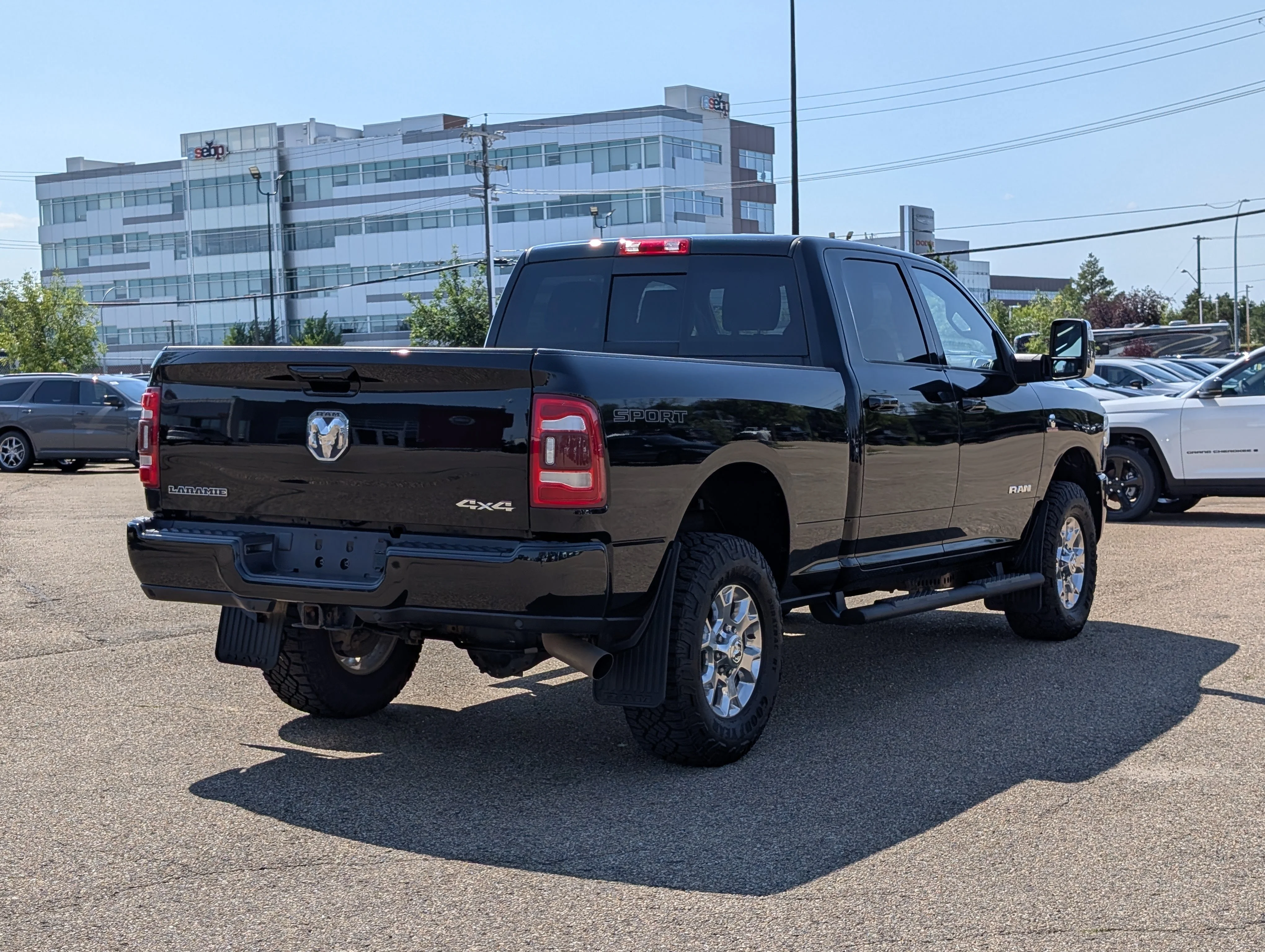 Used 2023 Diamond Black Crystal Pearlcoat Ram Laramie image 7