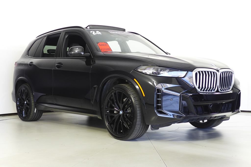 Certified Used 2024 Black Sapphire Metallic BMW sDrive40i image 4