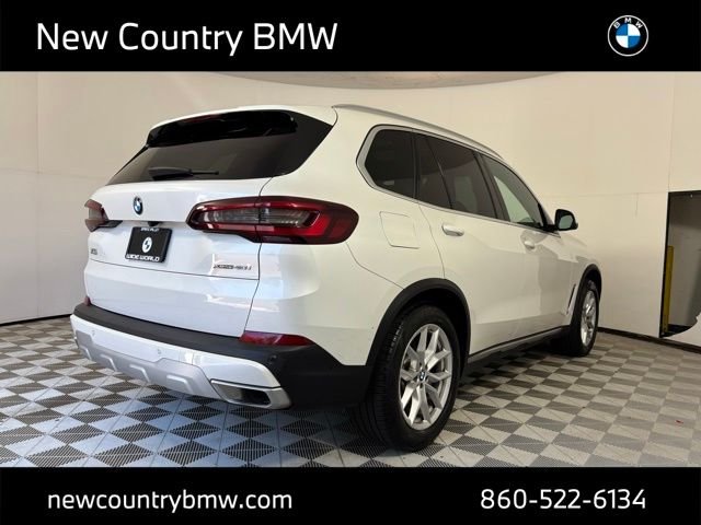 Used 2023 Mineral White Metallic BMW xDrive40i image 7