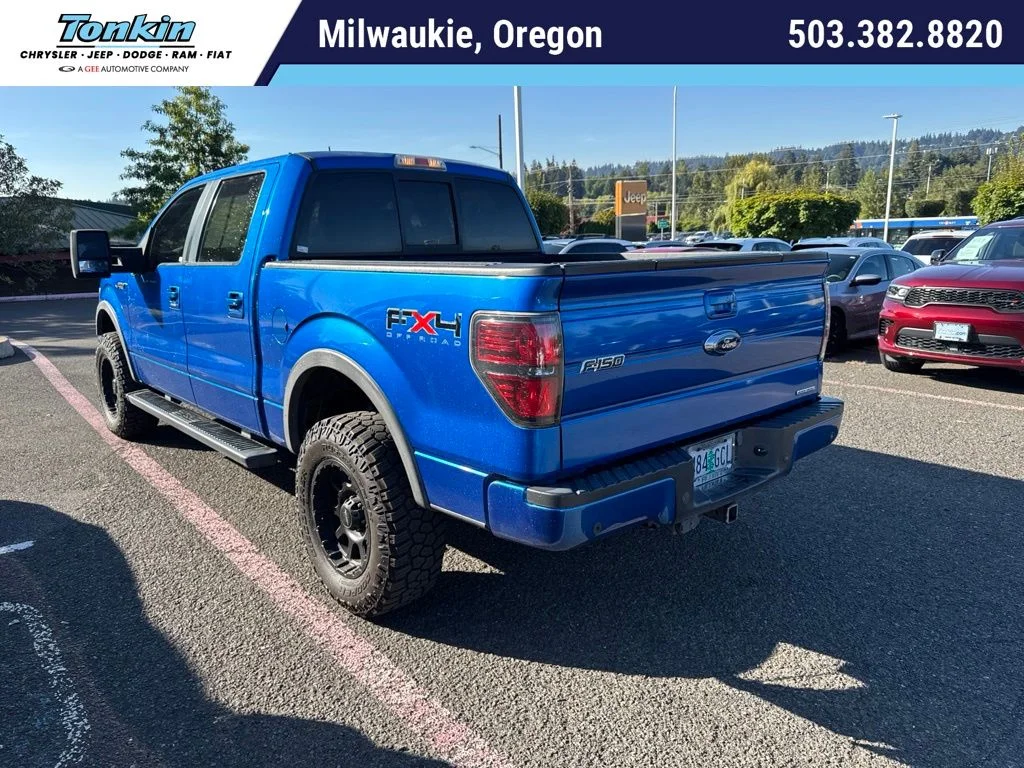 Used 2011 Blue Flame Metallic Ford FX4 image 1
