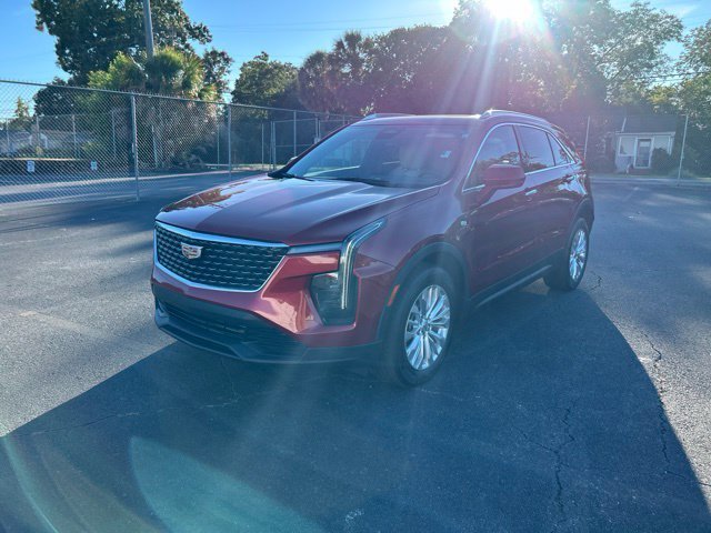 Used 2024 Radiant Red Tintcoat Cadillac Luxury image 1