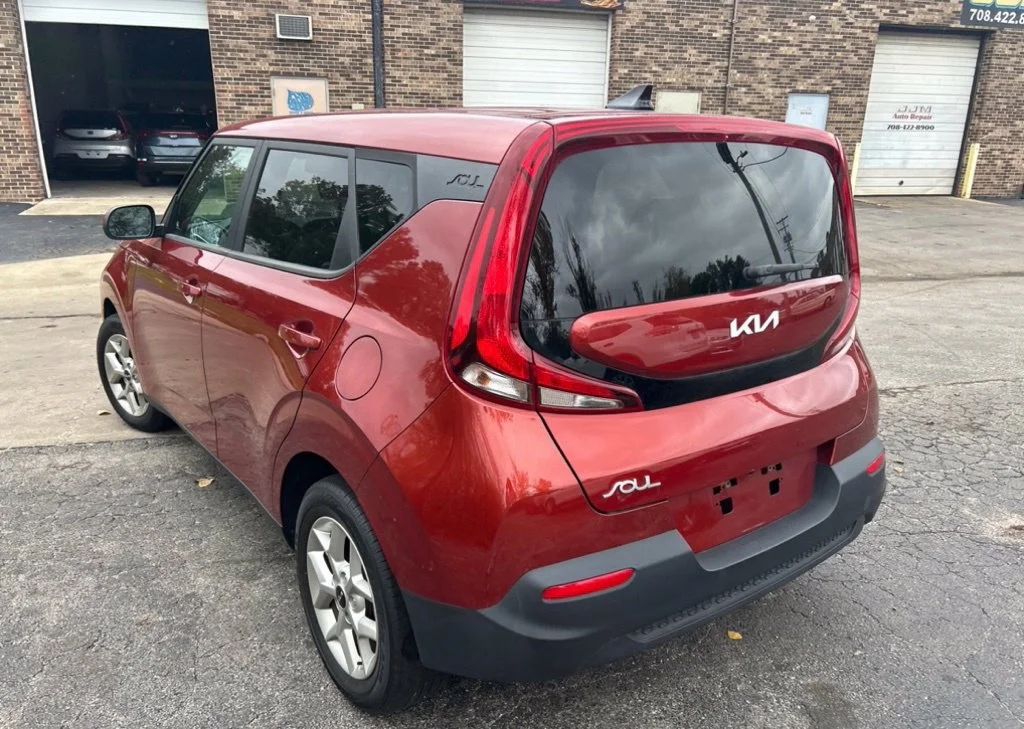 Used 2022 Orange Kia LX image 7