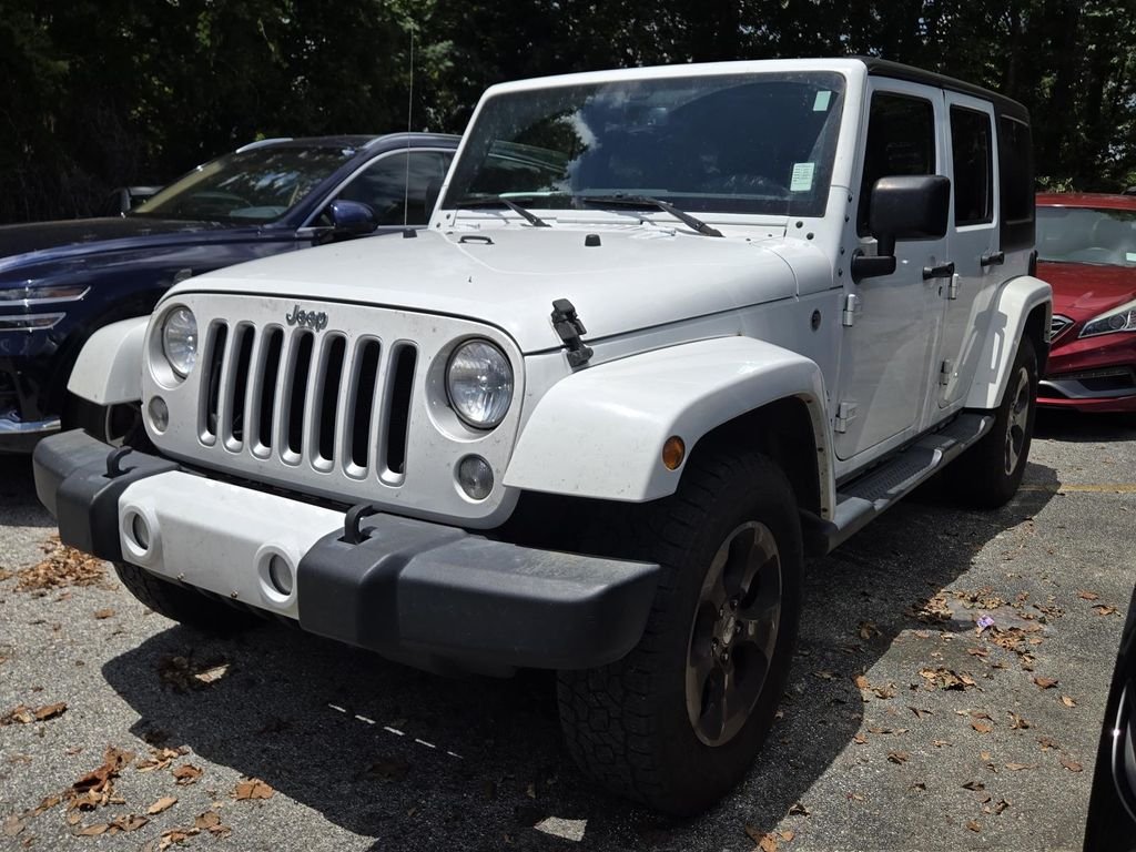 Used 2016 White Jeep Sahara image 4