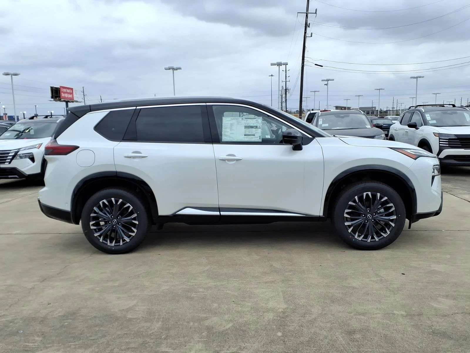 2026 Nissan Rogue Platinum White at Robbins Nissan