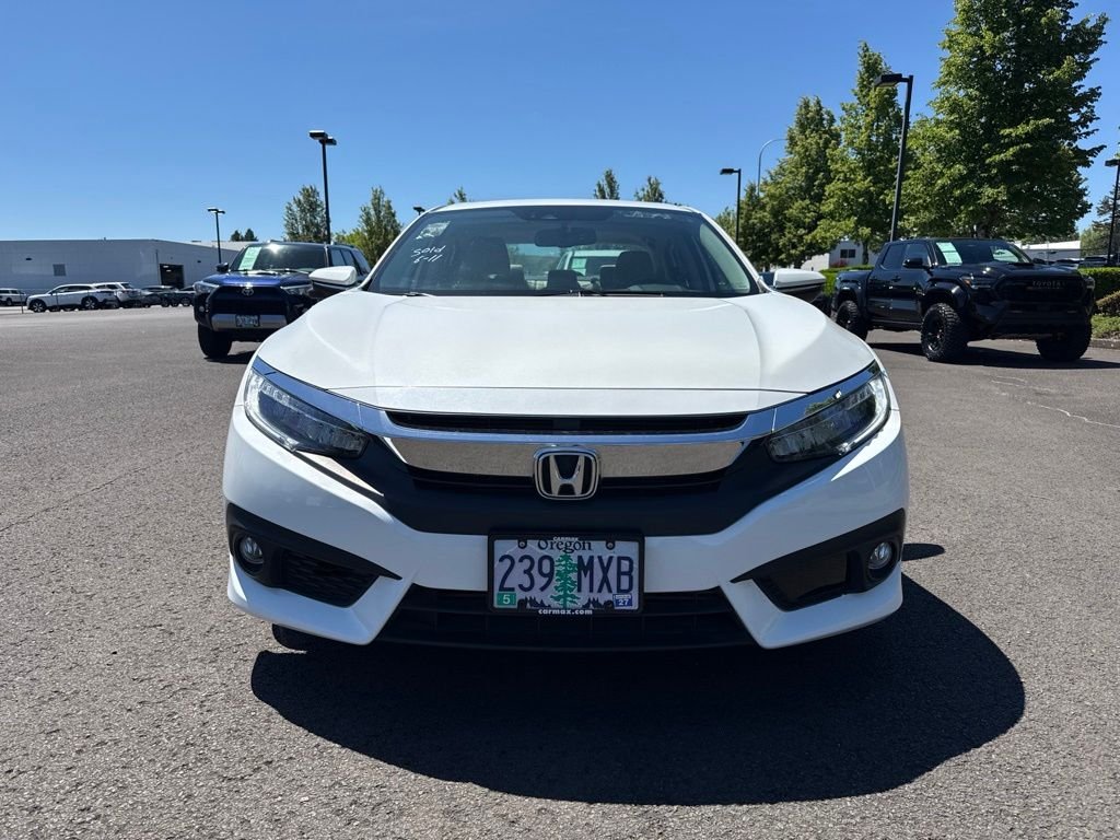 Used 2016 White Orchid Pearl Honda Touring image 2