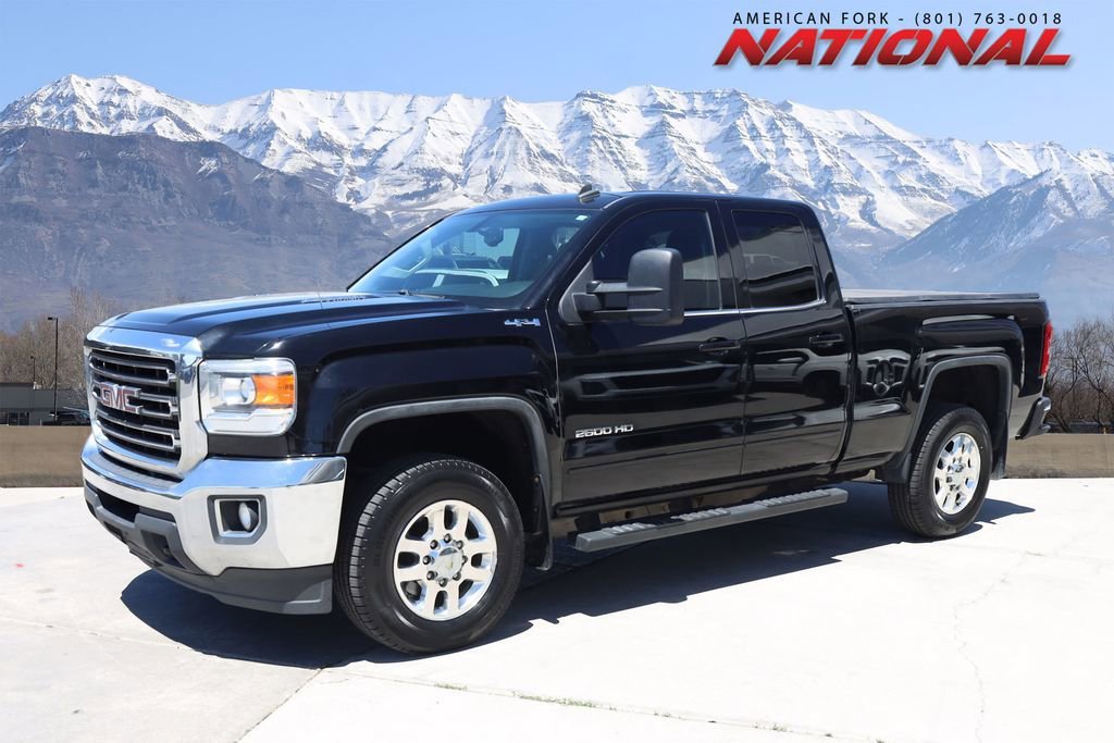 2015 GMC Sierra 4WD Double Cab Short Box SLE's photo