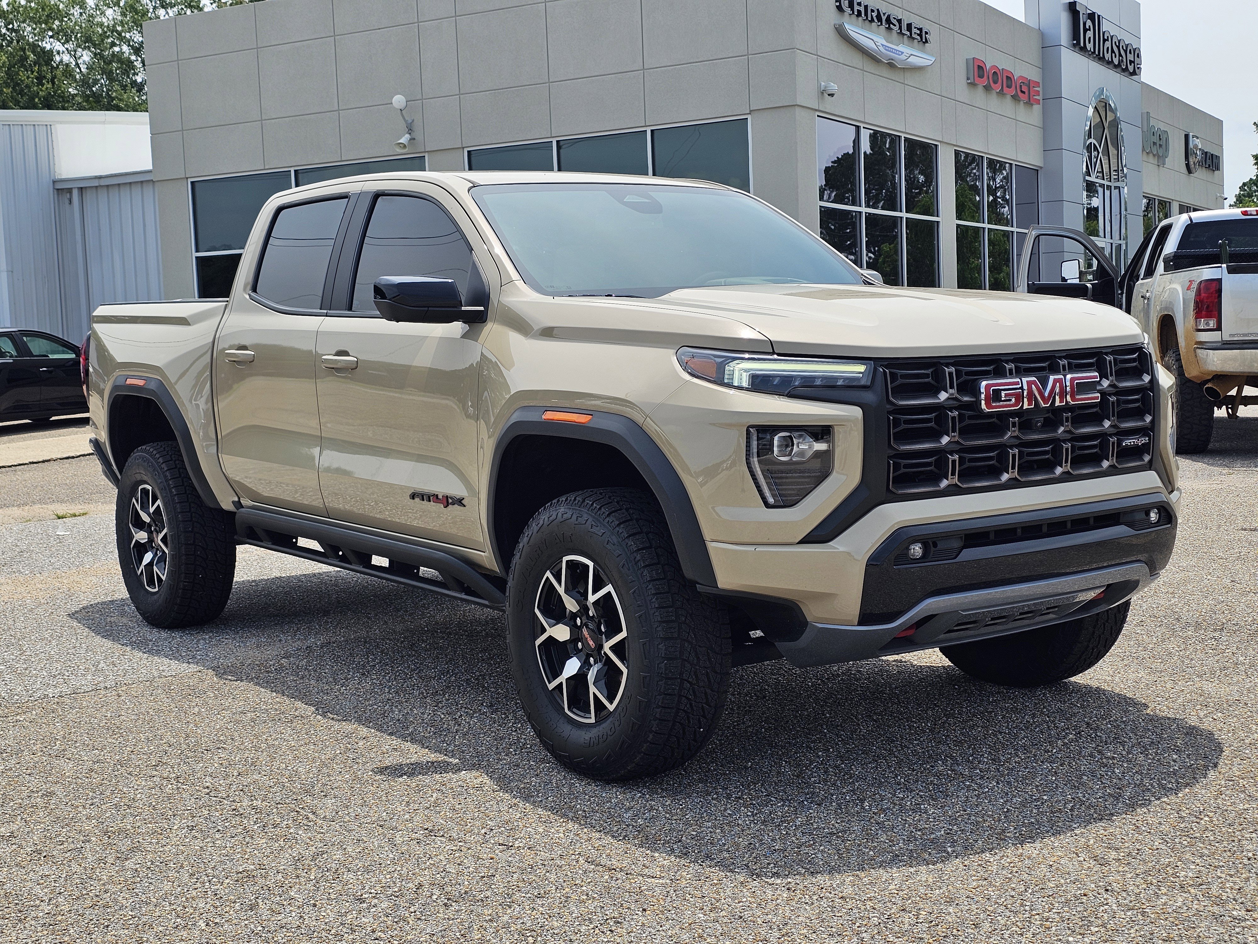 Used 2023 Desert Sand Metallic GMC 4WD AT4X image 5