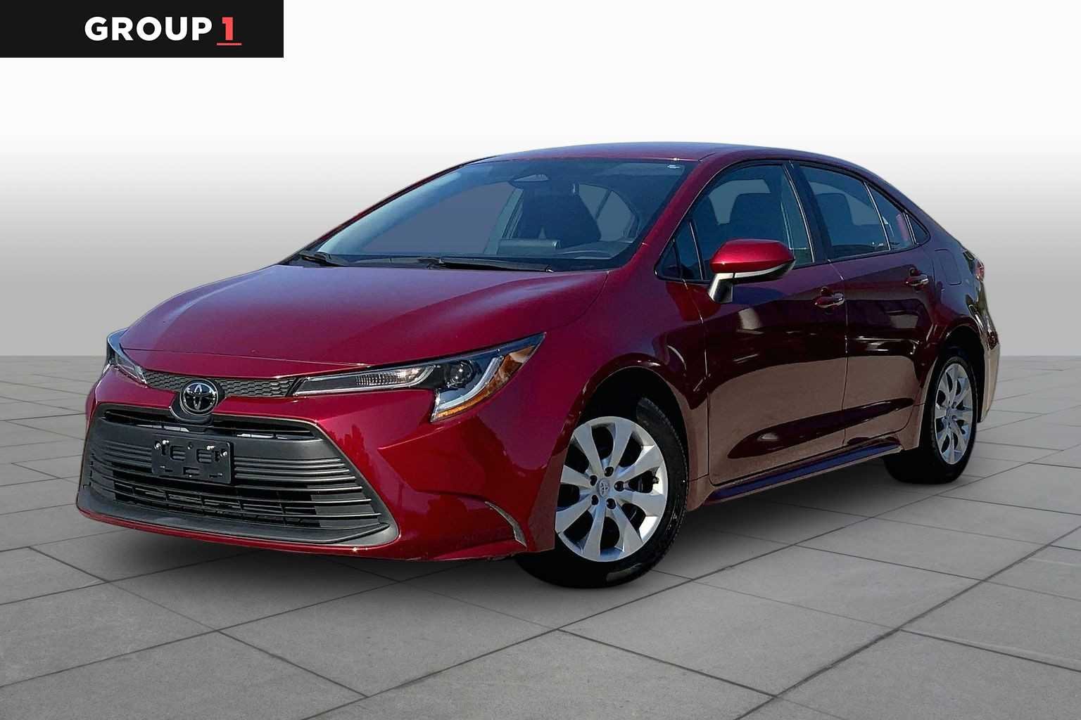Used 2025 Ruby Flare Pearl Toyota LE image 1