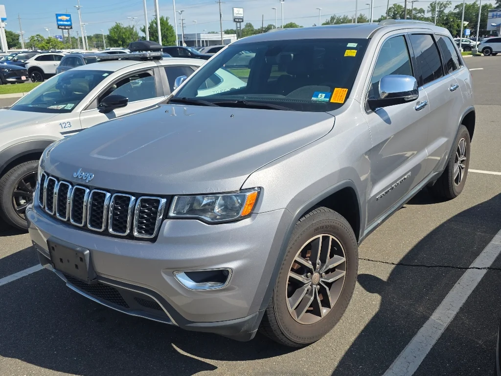 Used 2018 Billet Silver Metallic Clear Coat Jeep Limited image 1