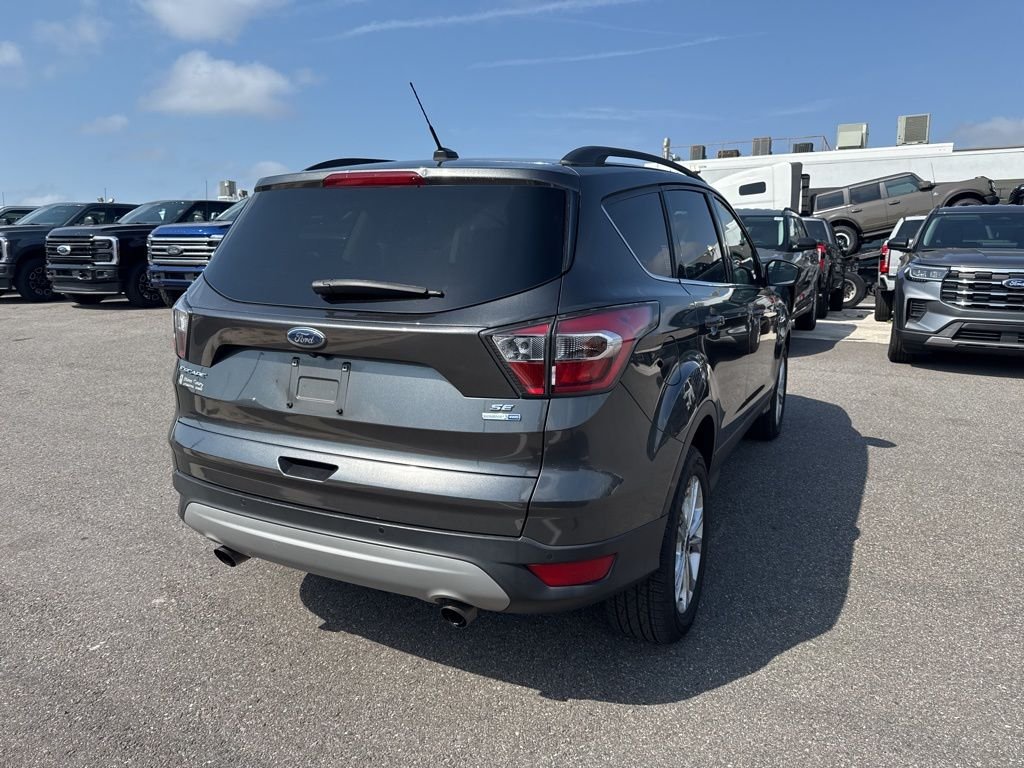 Used 2017 Ford Escape SE with VIN 1FMCU9G92HUB53604 for sale in Clermont, FL