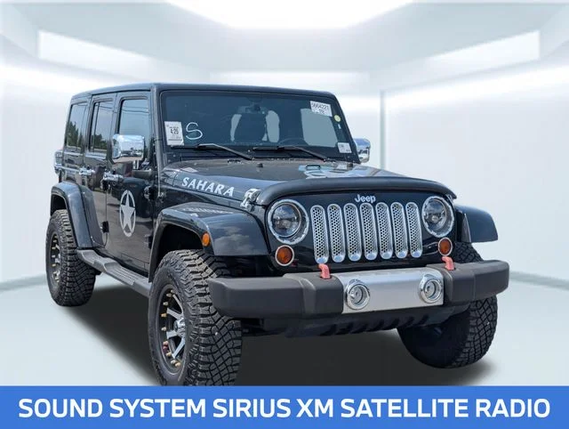 Used 2013 Black Jeep Unlimited Sahara image 8