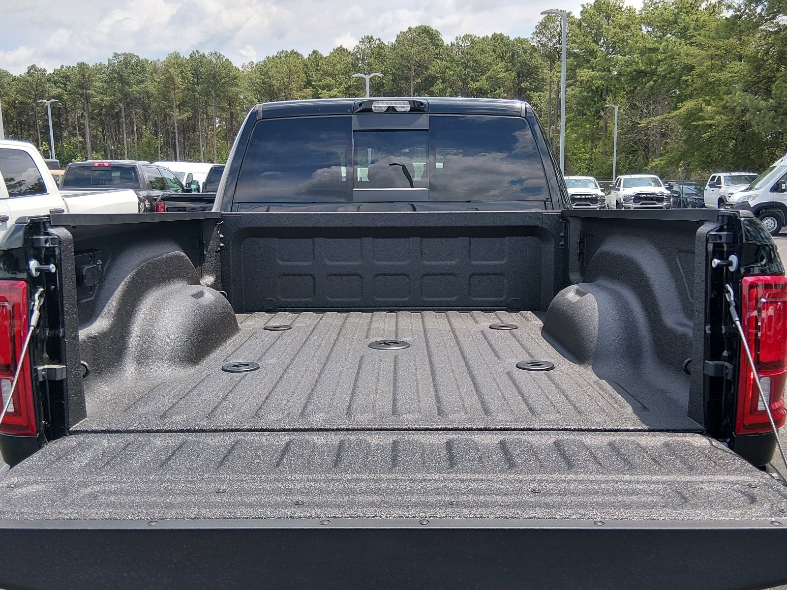 New 2026 Diamond Black Crystal Pearl-Coat Exterior Paint RAM Laramie Mega Cab 4x4 6