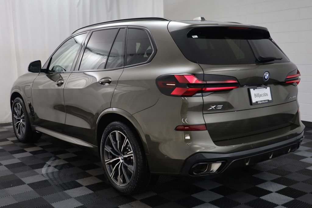 New 2026 Manhattan Green Metallic BMW xDrive50e image 17