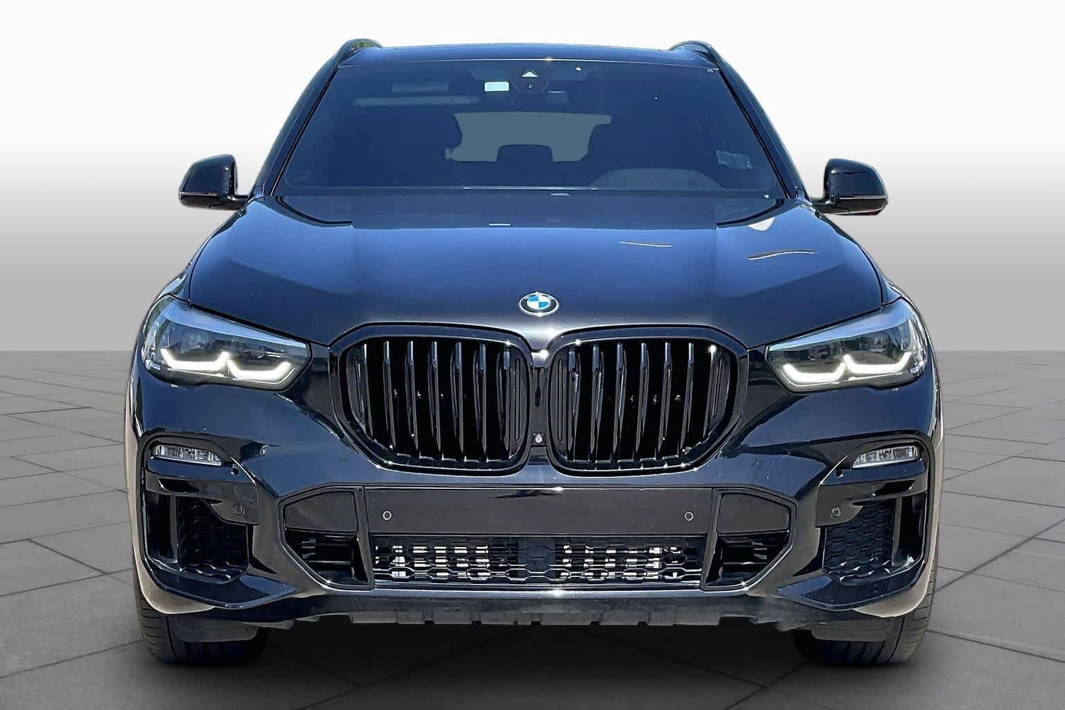 Used 2021 Black Sapphire Metallic BMW sDrive40i image 4