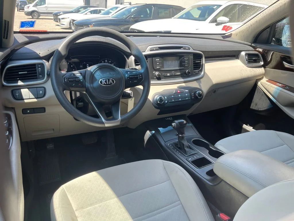 Used 2016 Dark Cherry Kia LX image 13
