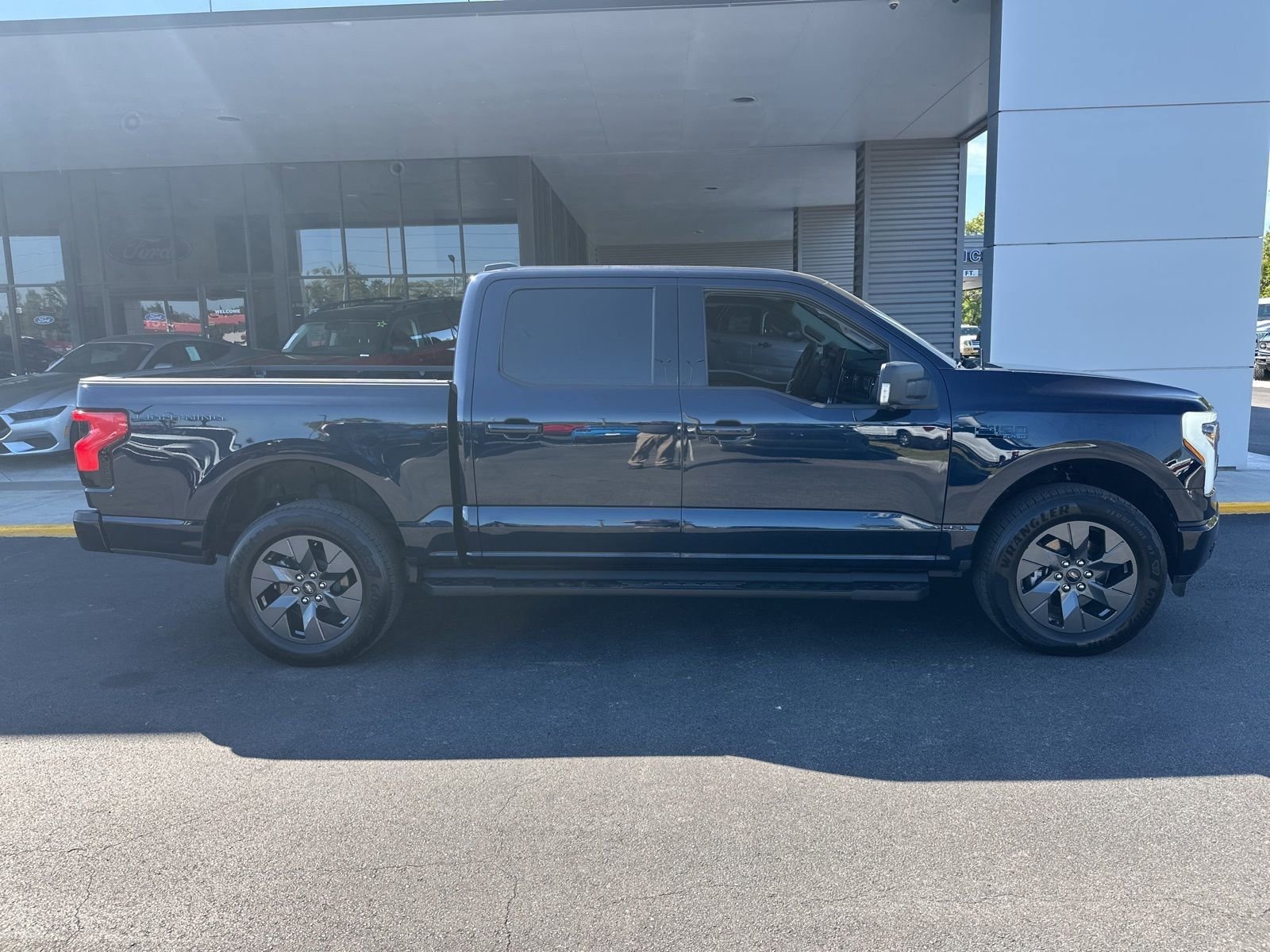 Used 2025 Ford F-150 Lightning Flash with VIN 1FT6W3LU7SWG09093 for sale in Spring Hill, FL