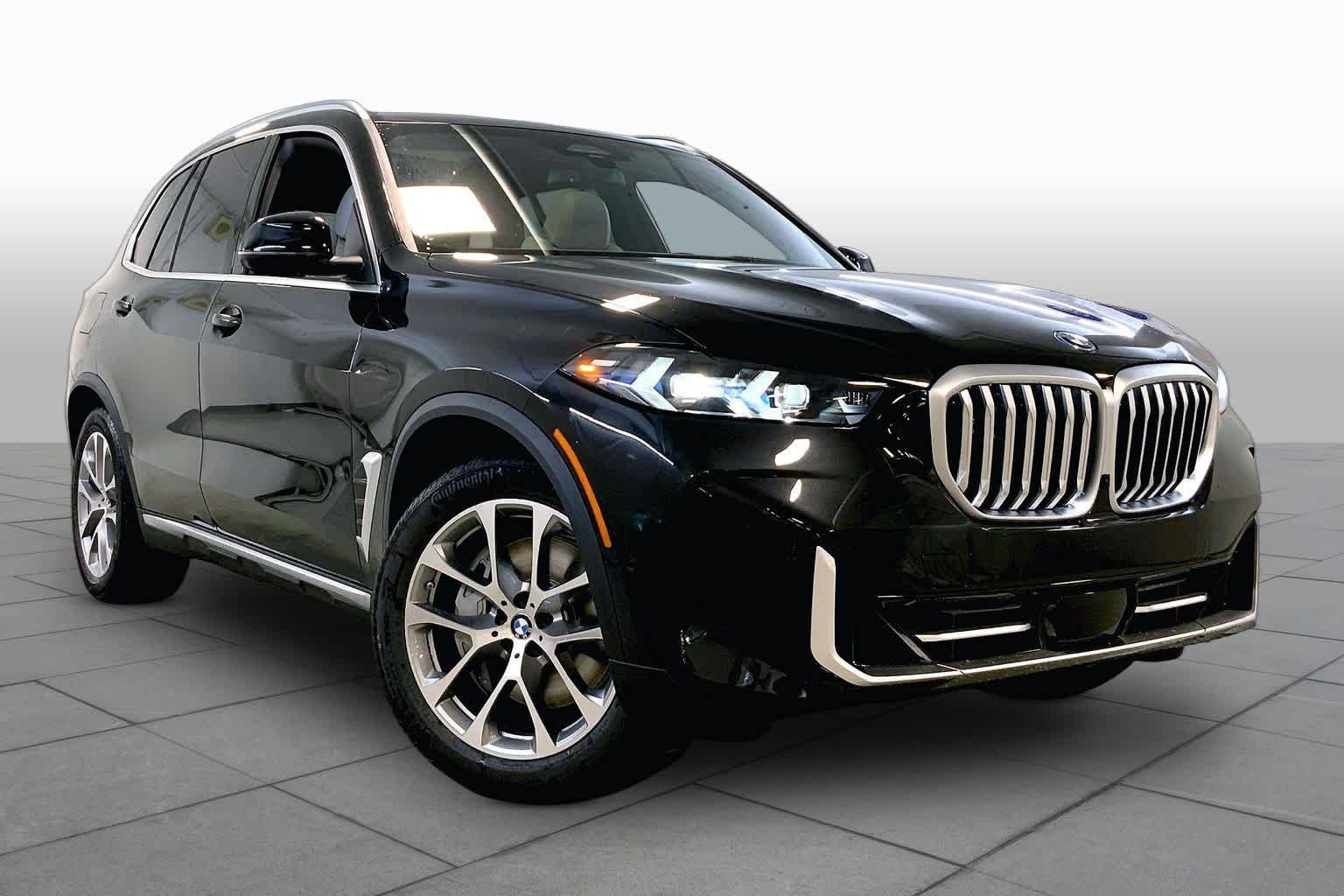 New 2026 Black Sapphire Metallic BMW xDrive50e image 2