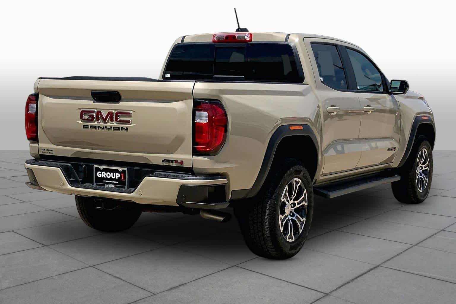Used 2024 Desert Sand Metallic GMC 4WD AT4 image 13