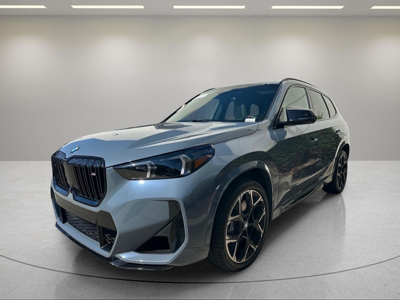 Used 2024 Storm Bay Metallic BMW M35i image 1