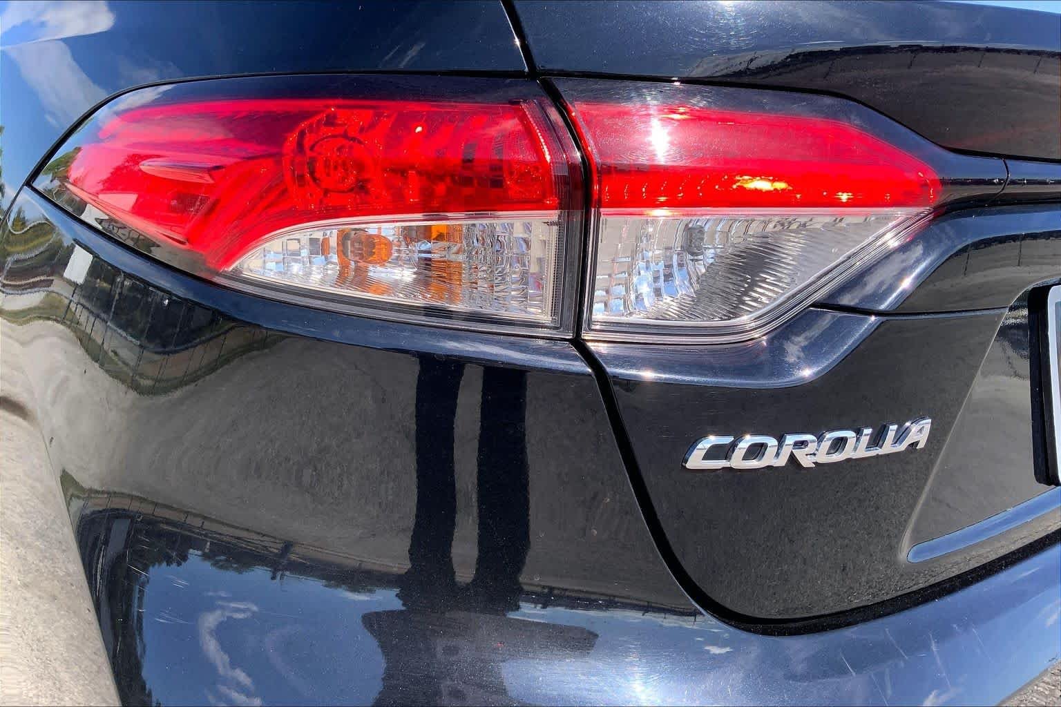 Used 2024 Midnight Black Metallic Toyota LE image 28