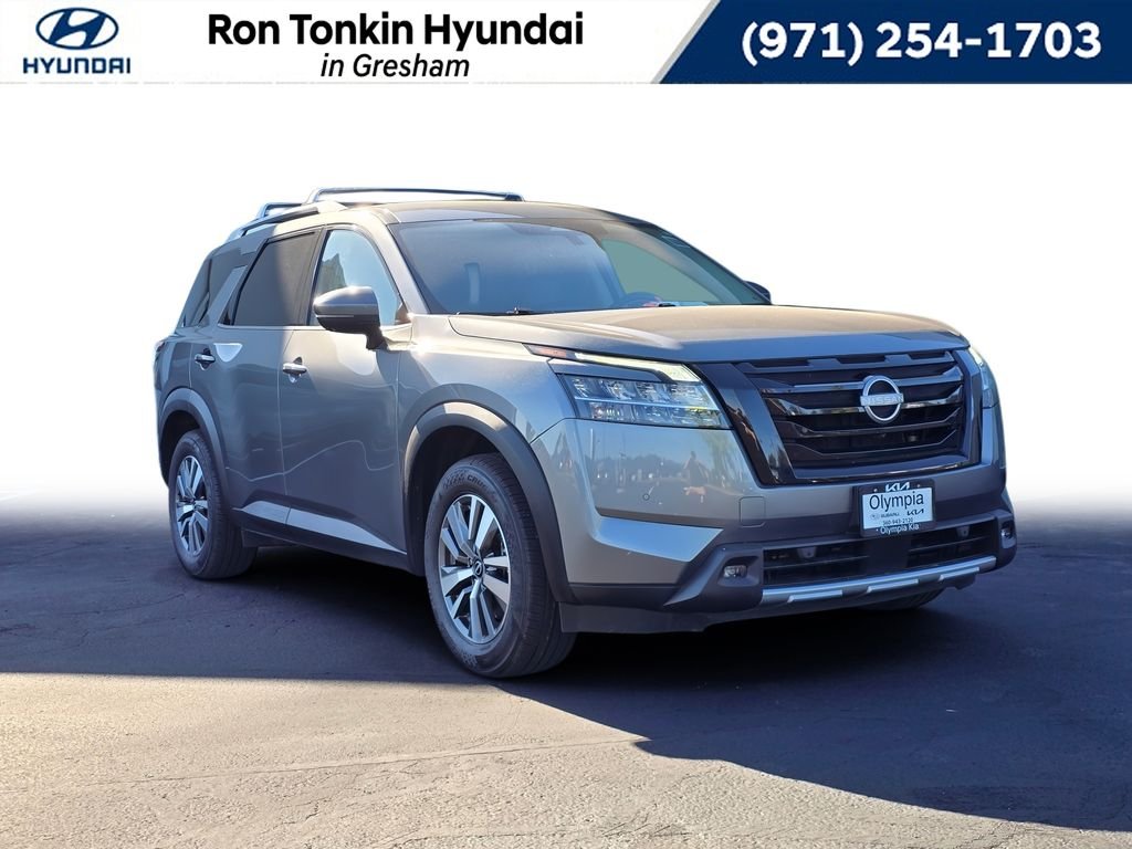 Used 2023 Gun Metallic Nissan SL image 1