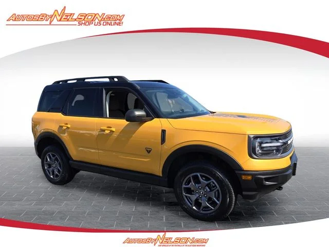 Used 2022 Orange Ford Badlands image 1