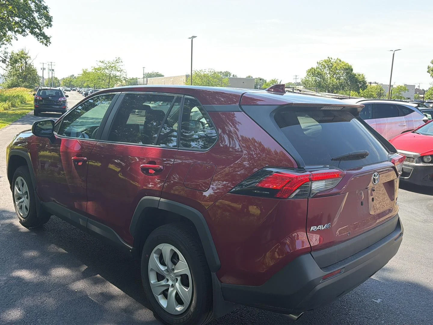 Used 2023 Ruby Flare Pearl Toyota LE image 4
