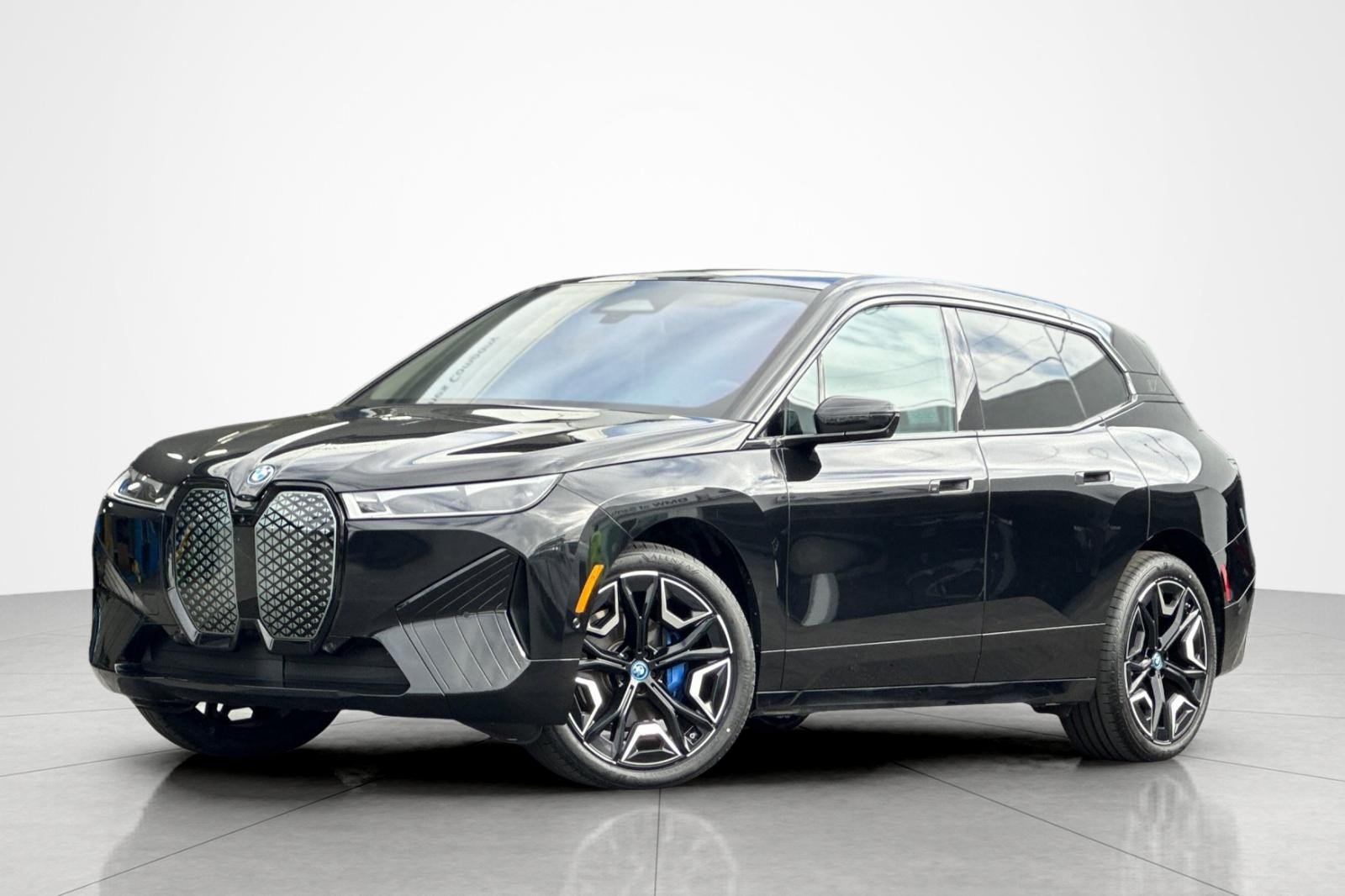 Certified Used 2024 Black Sapphire Metallic BMW xDrive50 image 1