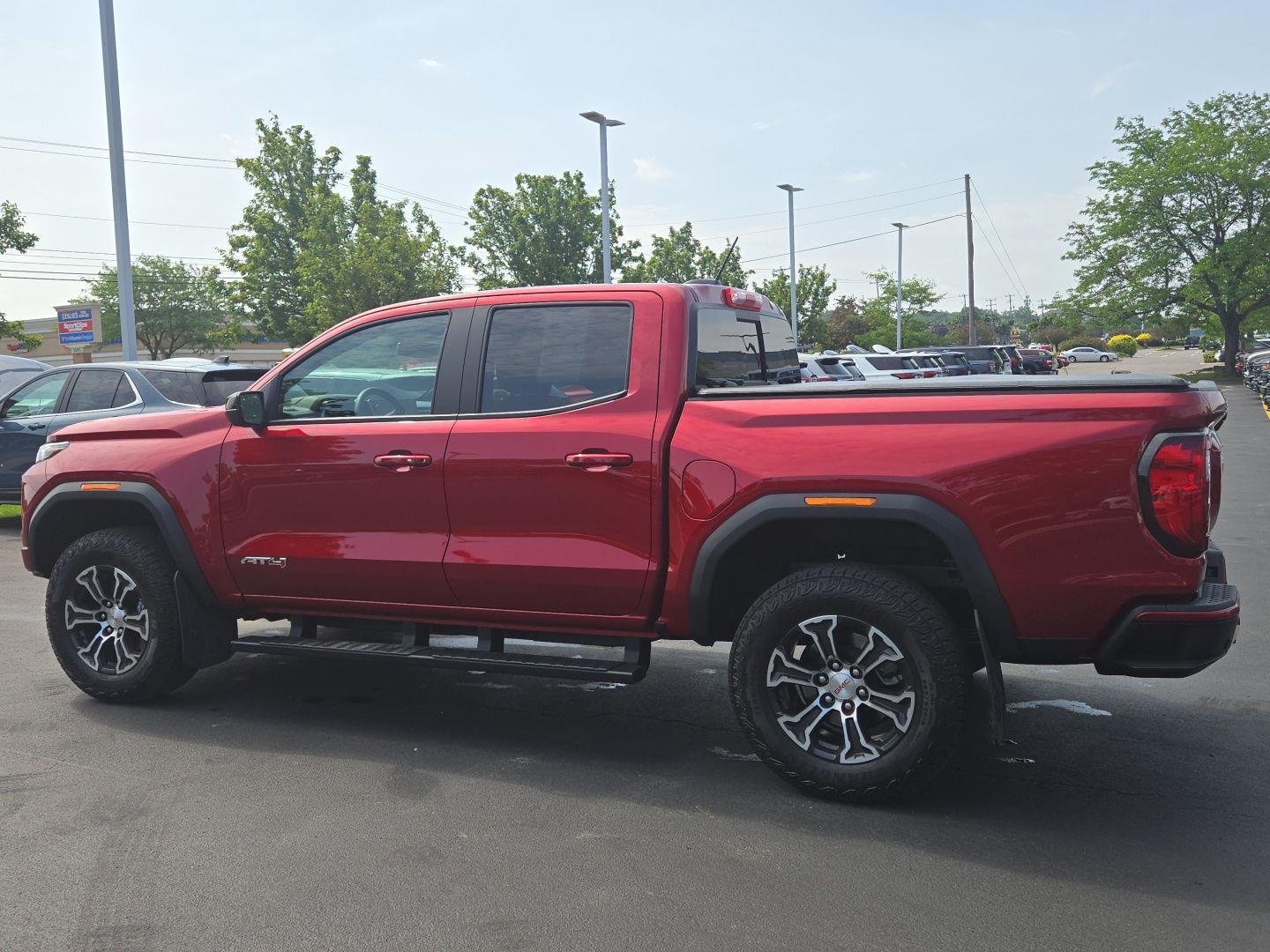 Used 2025 Volcanic Red Tintcoat GMC 4WD AT4 image 3