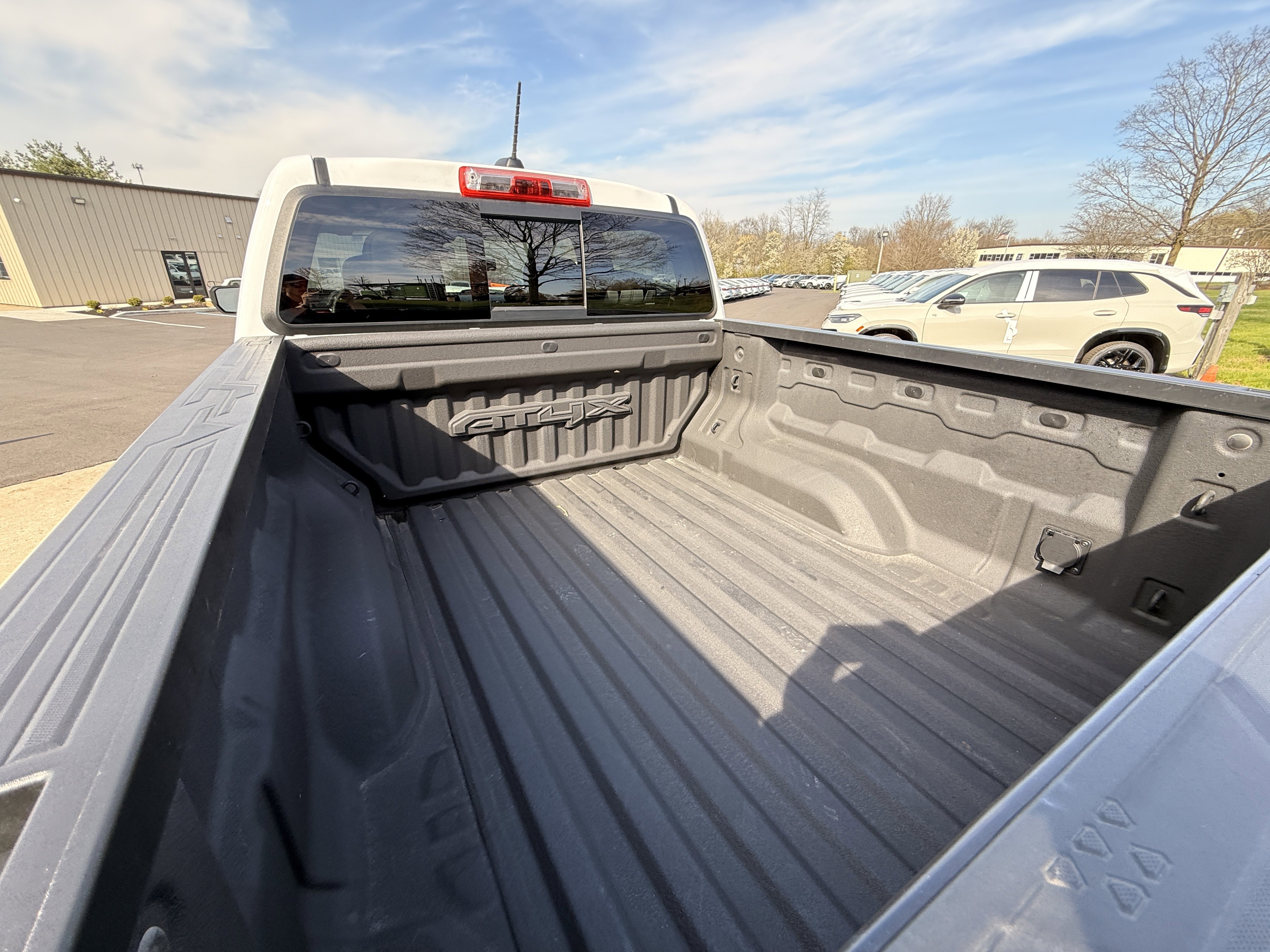 Used 2024 Summit White GMC 4WD AT4X image 14