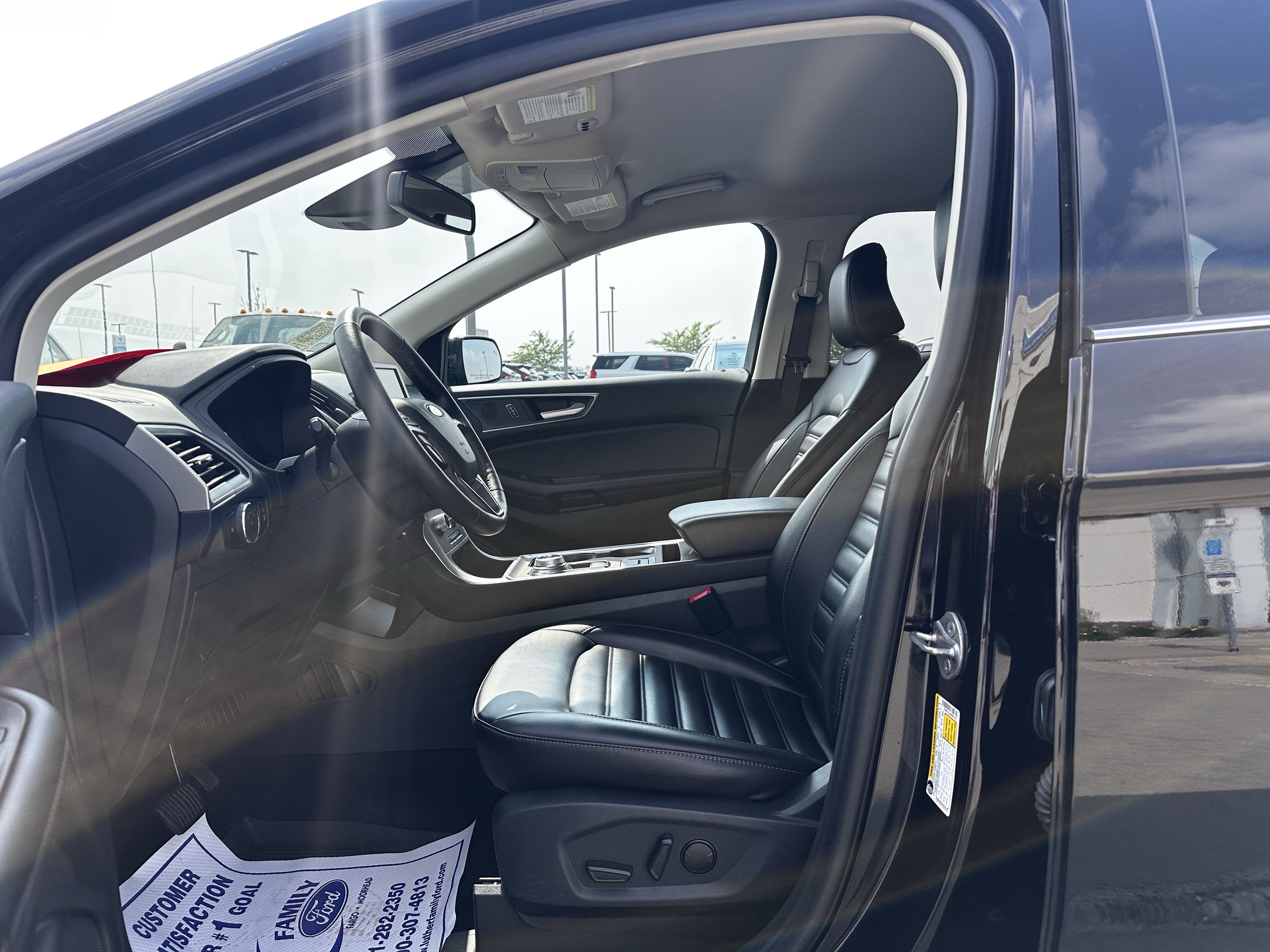 Used 2024 Agate Black Metallic Ford SEL image 18
