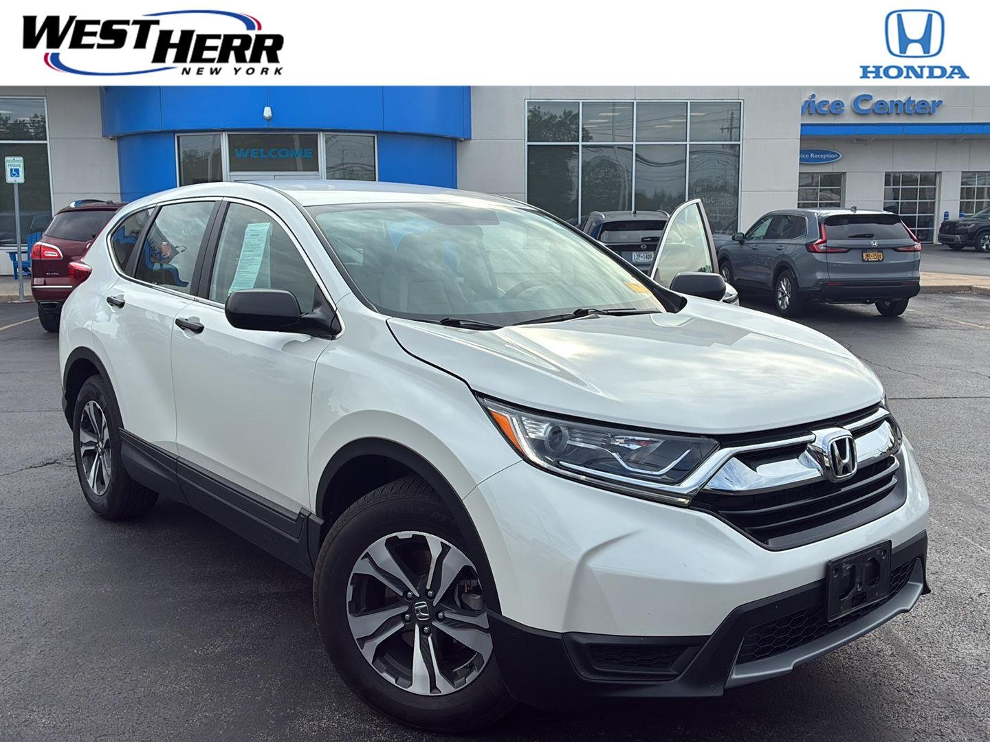 Used 2018 White Diamond Pearl Honda LX image 1