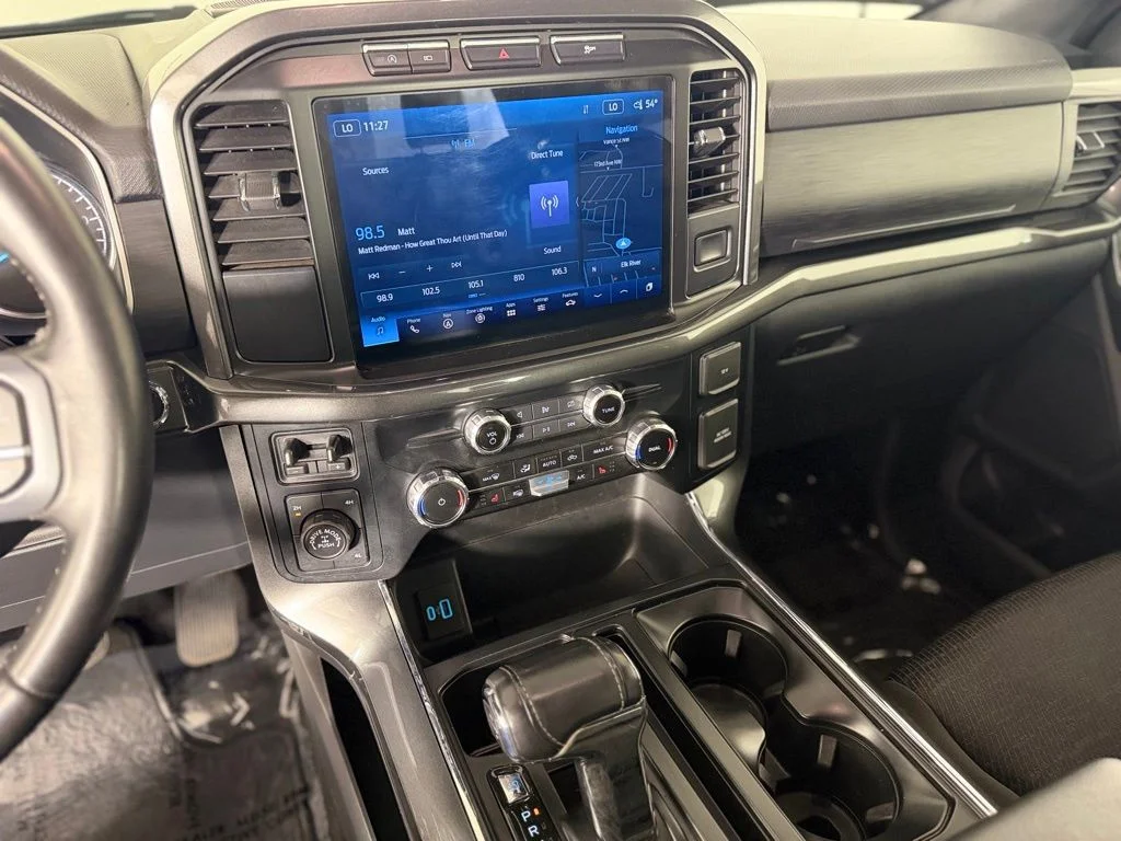 Used 2023 Ford F-150 XLT with VIN 1FTFW1E88PFB66464 for sale in Elk River, Minnesota