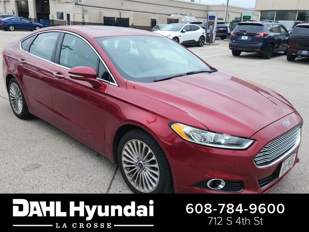 Used 2016 Ruby Red Metallic Tinted Clearcoat Ford Titanium image 1