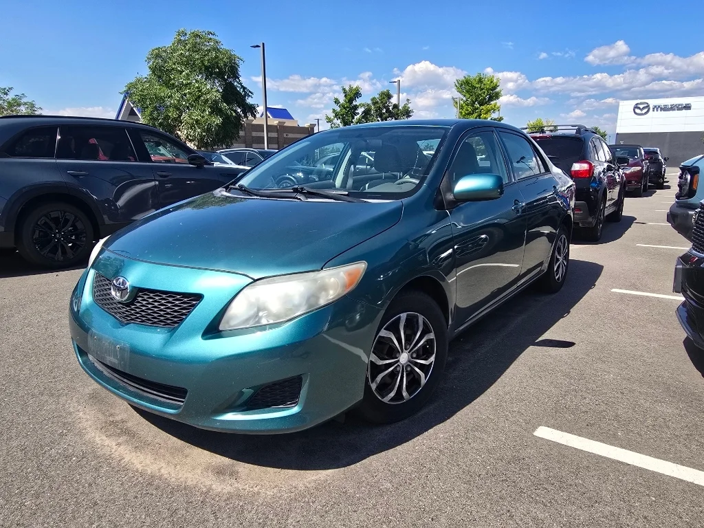 Used 2009 Capri Sea Metallic Toyota LE image 1