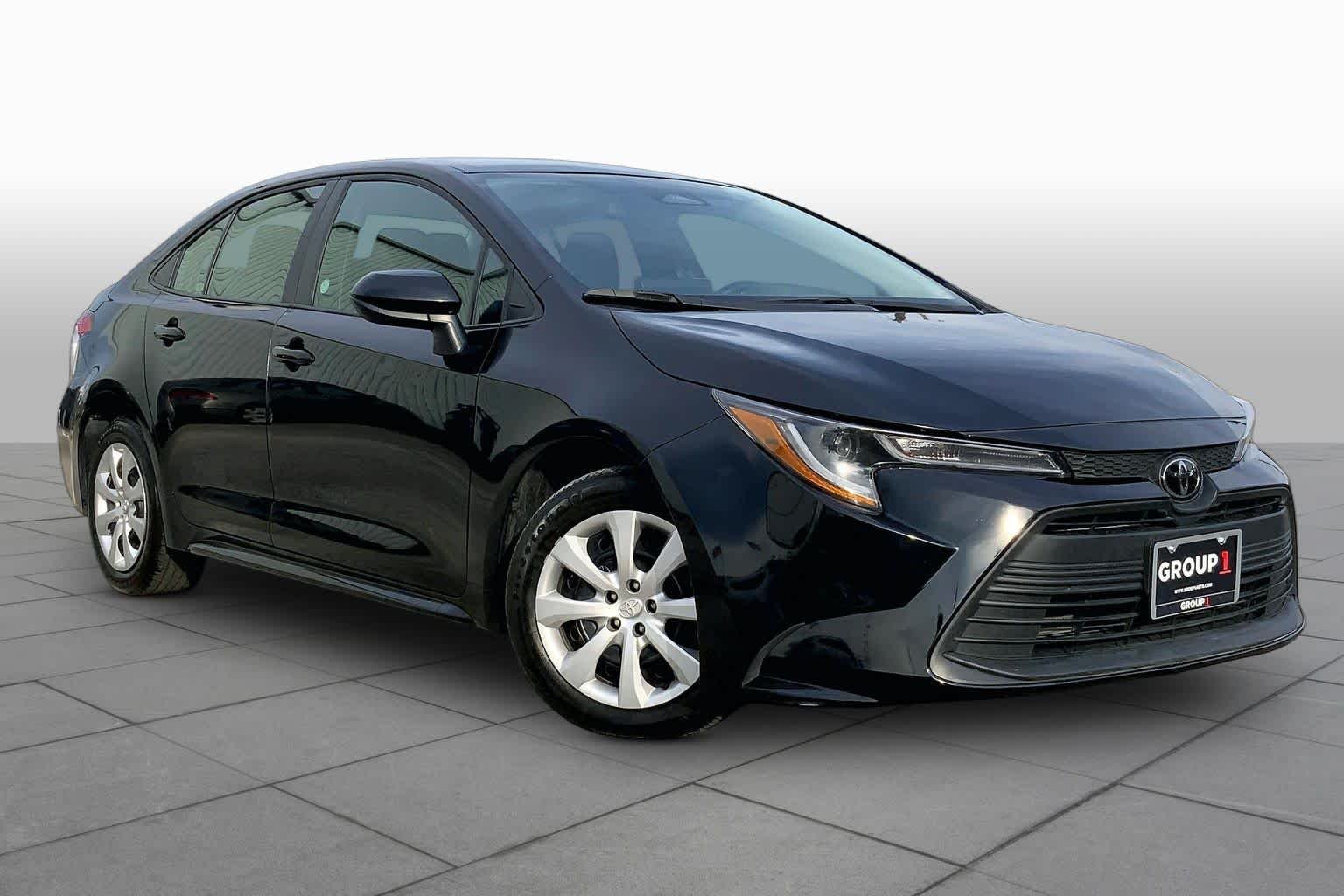 Used 2025 Midnight Black Metallic Toyota LE image 3
