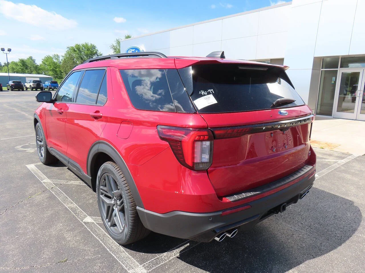 New 2026 Rapid Red Metallic Tinted Clearcoat Ford ST AWD 4dr SUV image 6