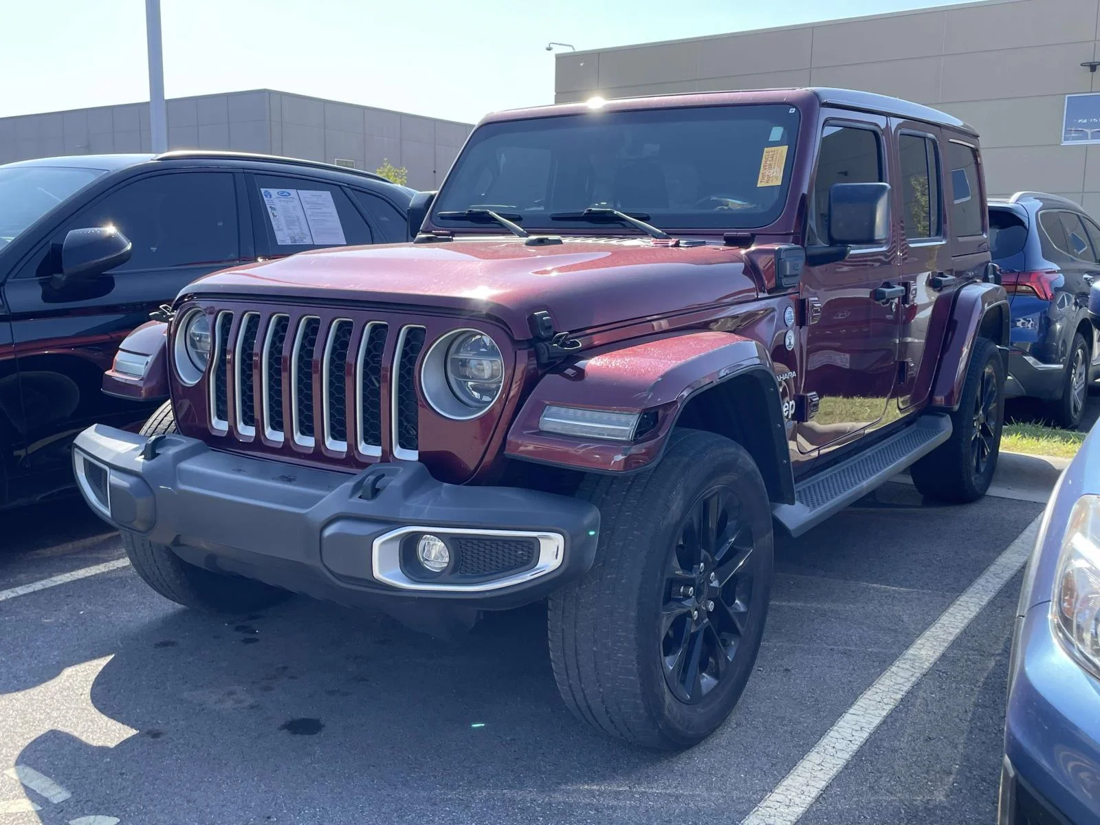 Used 2021 Snazzberry Pearlcoat Jeep Unlimited Sahara image 2