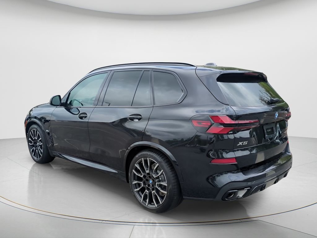 New 2026 Black Sapphire Metallic BMW xDrive50e image 3