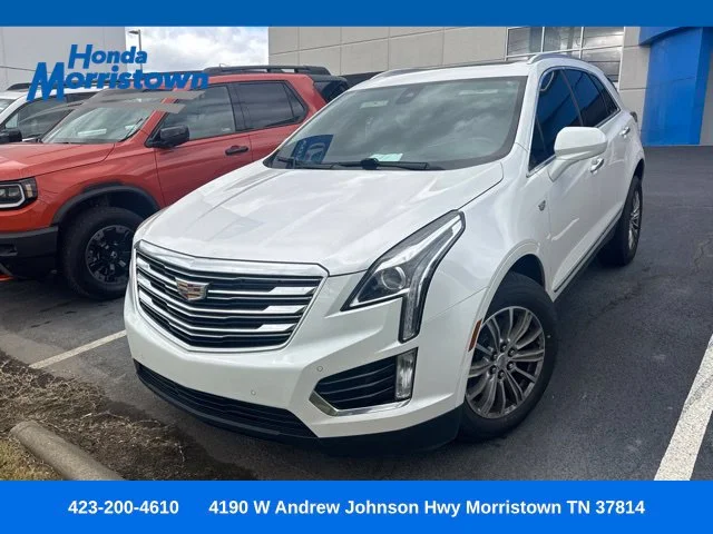 Used 2017 Crystal White Cadillac Luxury image 1