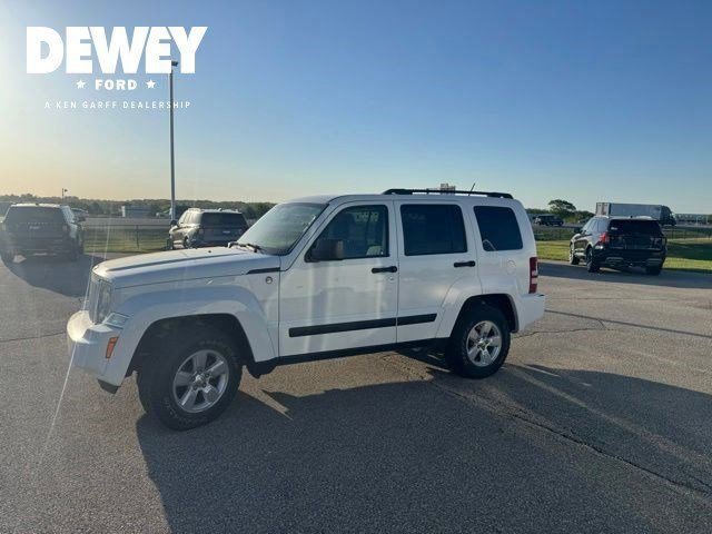Used 2012 Bright White Jeep Sport image 6