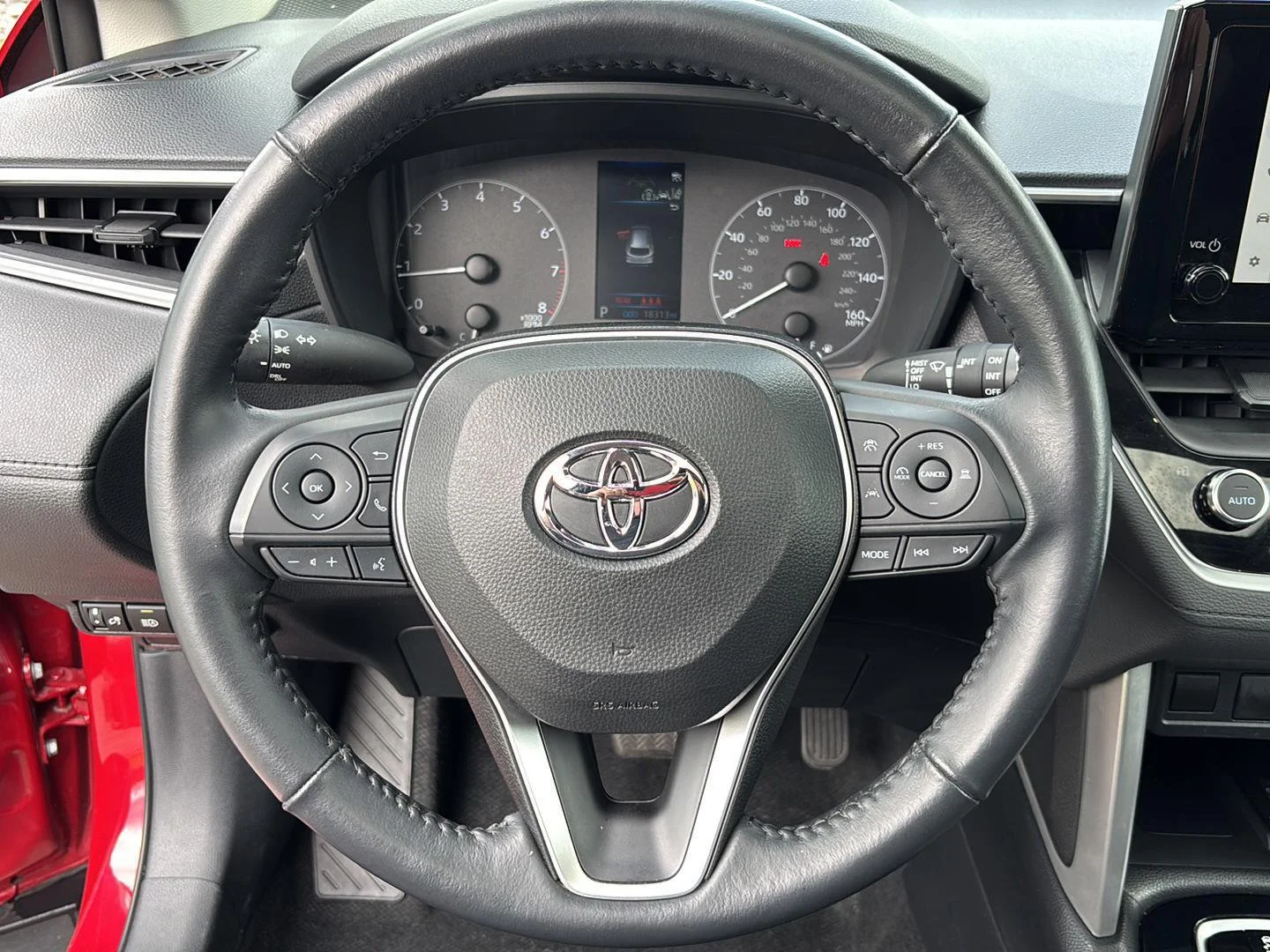 Used 2023 Barcelona Red Metallic Toyota LE image 20