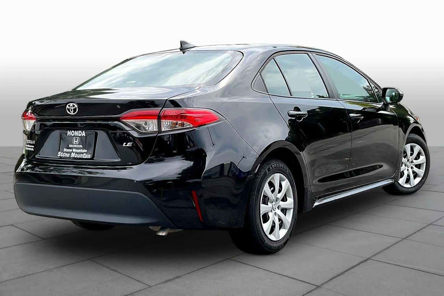 Used 2024 Midnight Black Metallic Toyota LE image 13