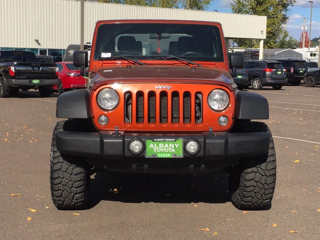 Used 2014 Orange Jeep Sport image 9