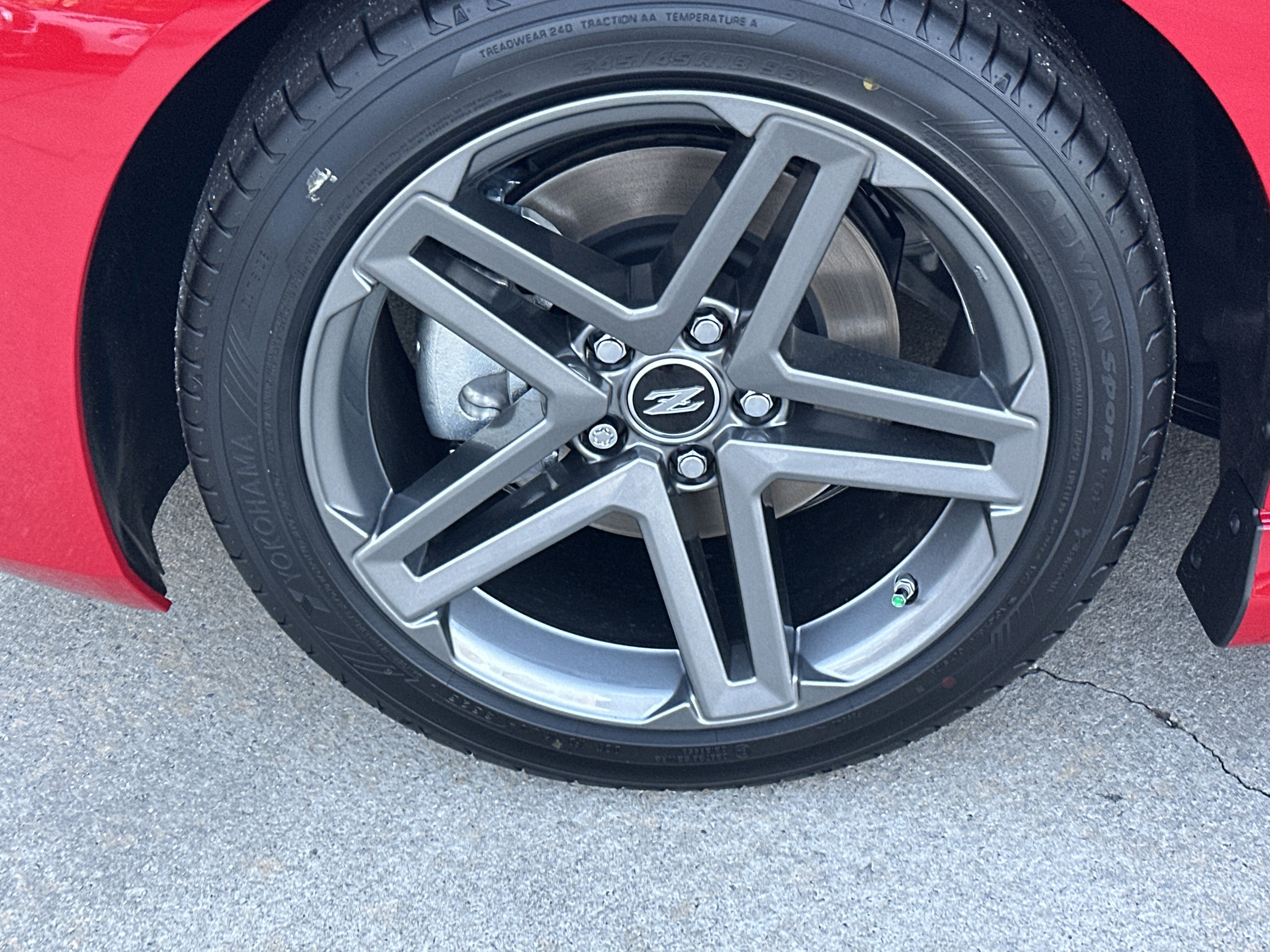 New 2026 Solid Red/Super Black Nissan Sport image 12