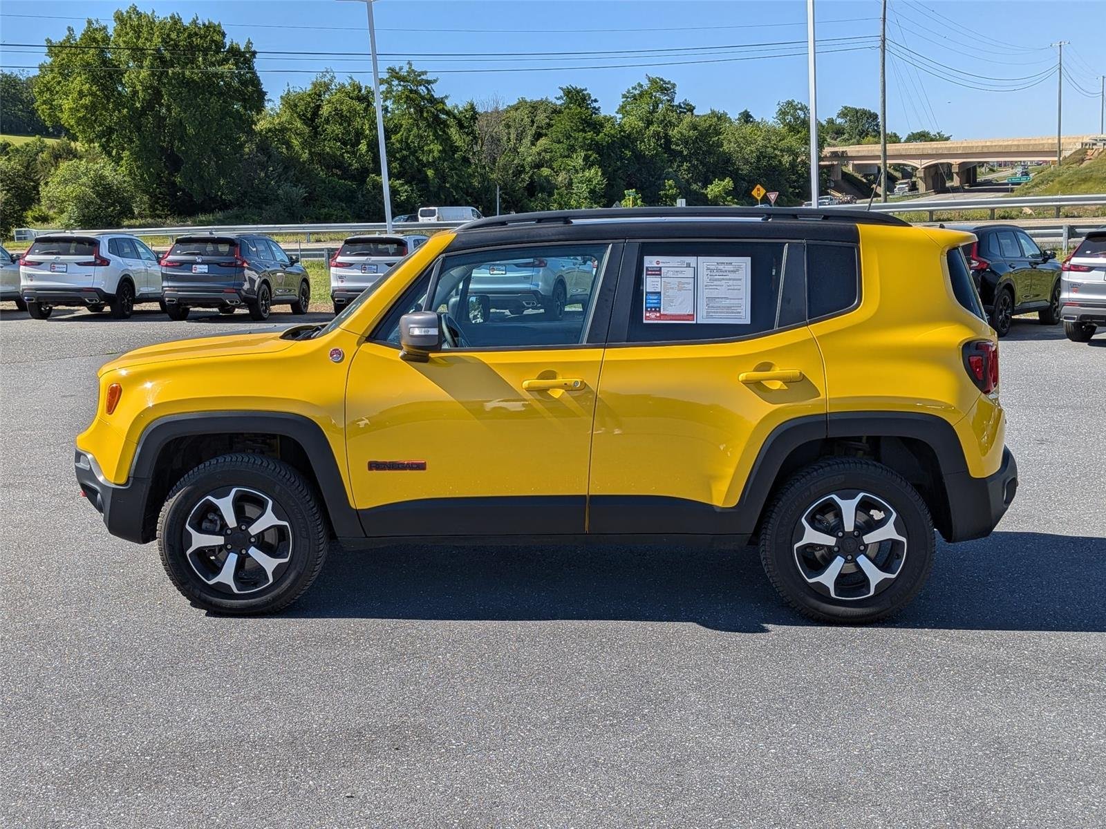 Used 2019 Solar Yellow Clearcoat Jeep Trailhawk image 8