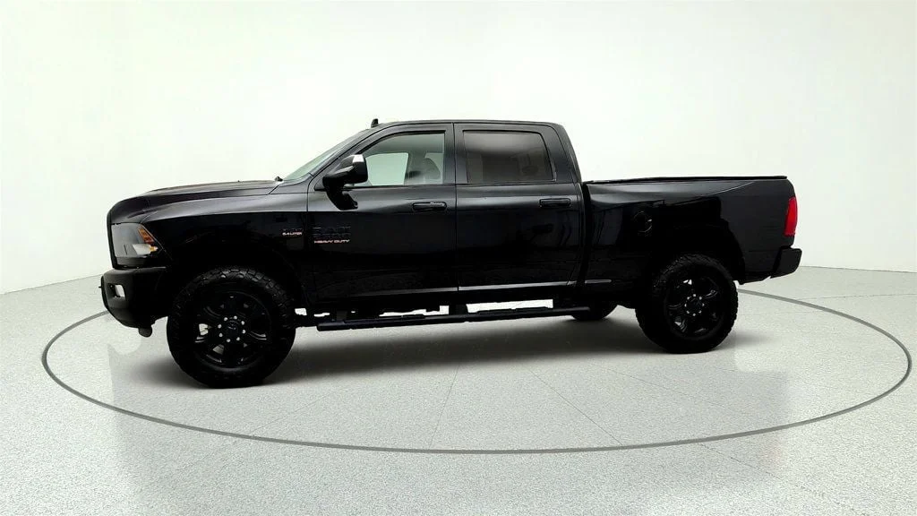 Used 2016 Brilliant Black Crystal Pearlcoat Ram 4WD Crew Cab 149