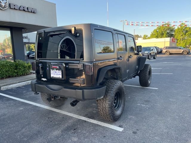 Used 2017 Black Jeep Unlimited Sport image 3