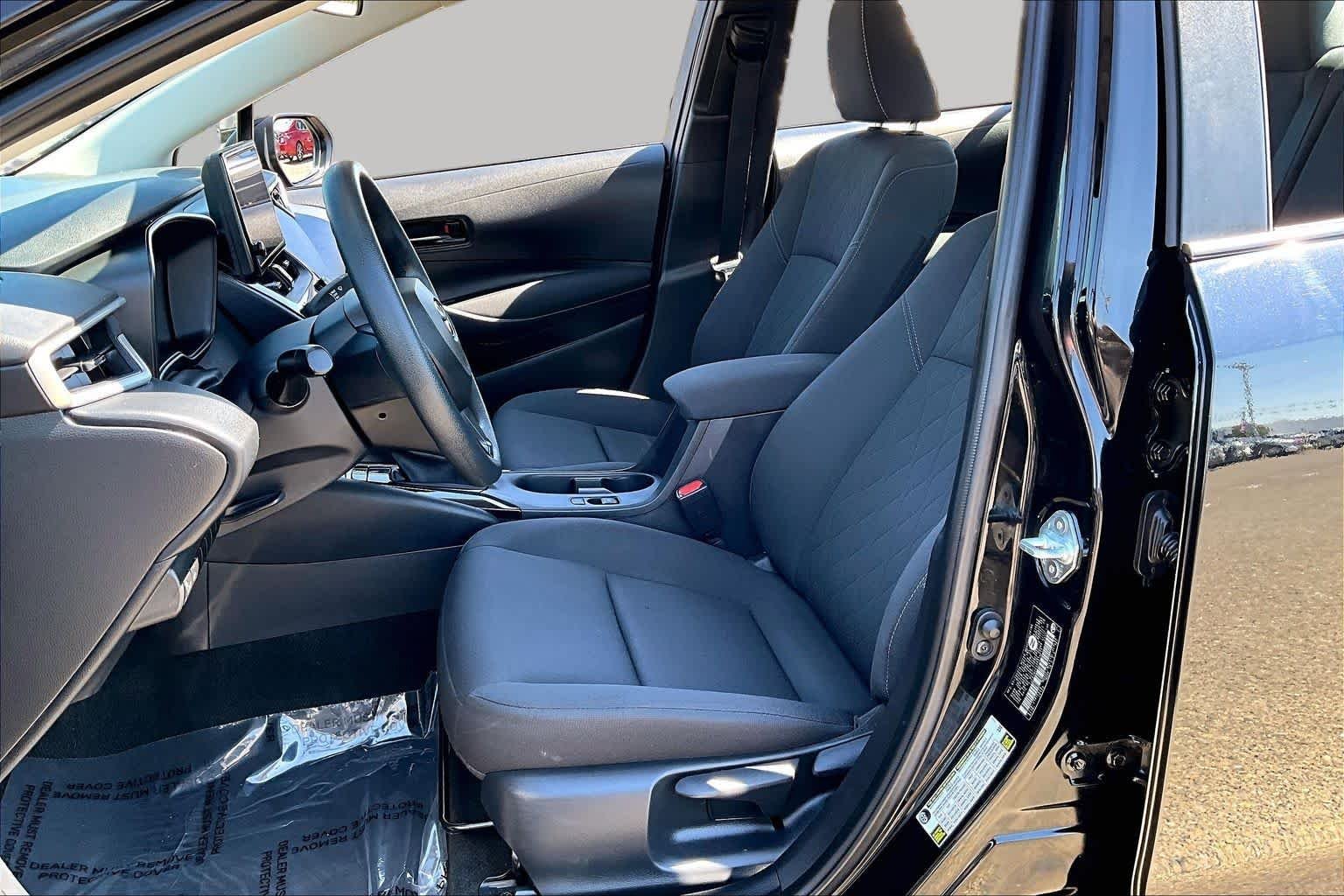 Used 2023 Midnight Black Metallic Toyota LE image 7