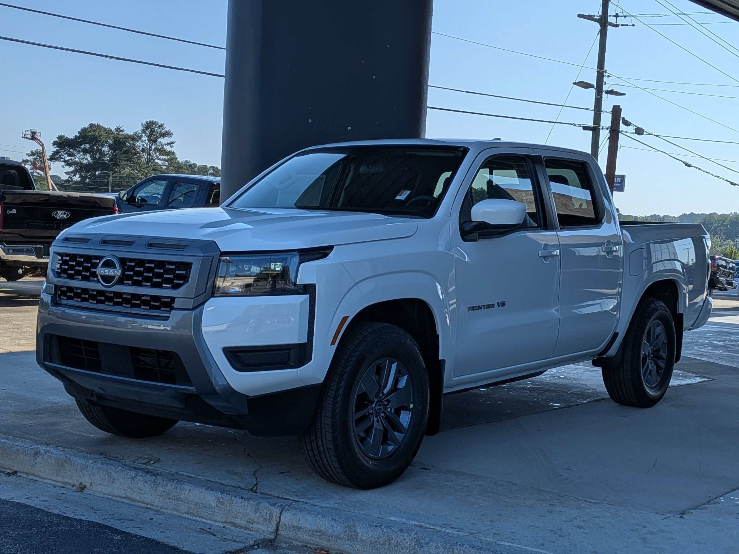 New 2027 Glacier White Nissan Crew Cab SV image 7